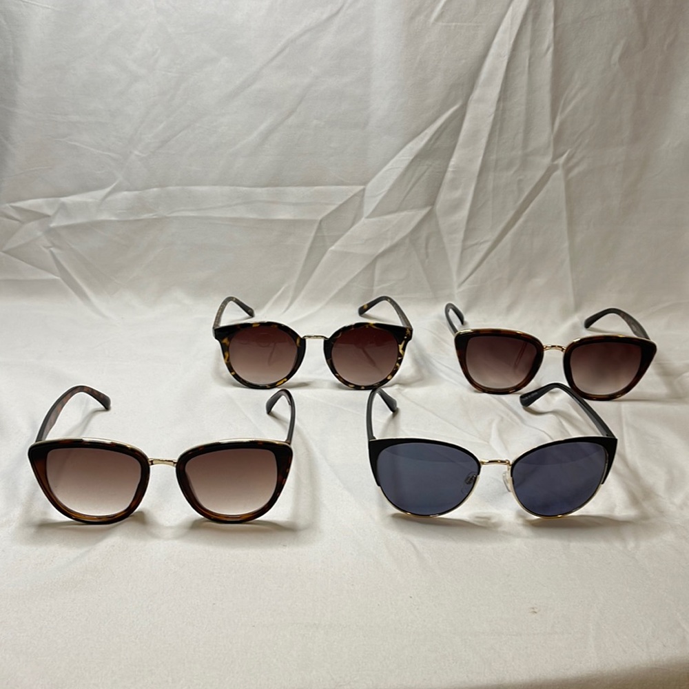 4 pairs of various target sunglasses